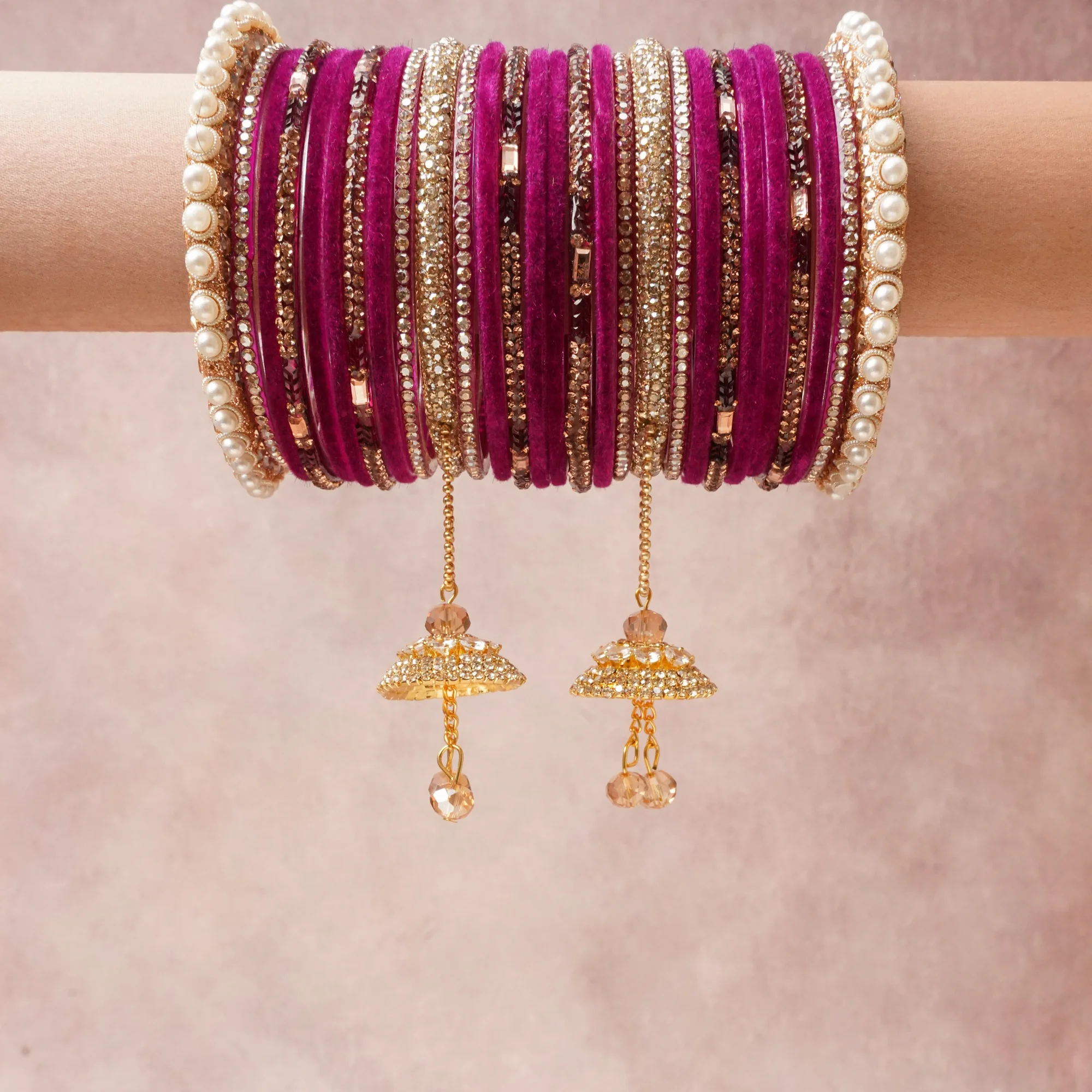 A commanding Regal Magenta anchors this beautiful set, enriched with accents of Antique Gold, Clear Crystal, Cream Pearl, Deep Garnet Red that add depth and dimension.

Featuring a striking composition of Velvet, Gold-toned Alloy, Crystal, Faux Pearl, Glass, this set carries intricate craftsmanship and strong presence. Grand in form, it is created for moments that deserve to be marked.